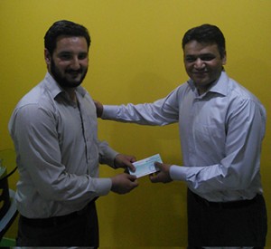 Shazeb Ali is presented a $2000 USD check for referring one client that took two full-time Pakistani developers from Allshore.